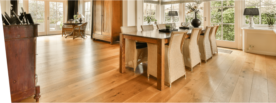 Beautiful hardwood flooring in a bright dining room in a home in Casa Grande